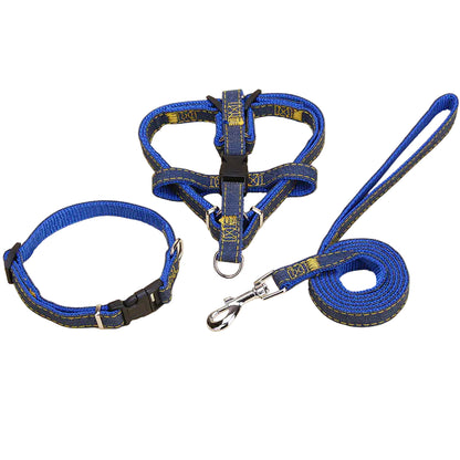 Blue dog collar, harness, and leash set on a beige background